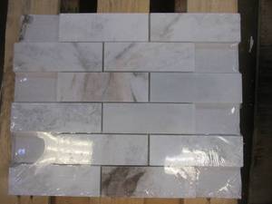 lot 556 image: LOT OF 4- MSI Arabescato Venato White 11.73 in. x 11.73 in. x 10mm Honed Marble Mosaic Tile