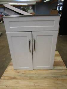 lot 559 image: Glacier Bay All-in-One Stainless Steel 24 in Laundry Sink with Faucet and Storage Cabinet in White (SCRATCH & DENT)