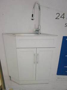 lot 584 image: Glacier Bay All-in-One Stainless Steel 24 in Laundry Sink with Faucet and Storage Cabinet in White (IN BOX)