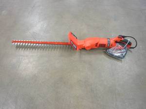 lot 637 image: BLACKDECKER 24 in. 3.3 Amp Corded Dual Action Electric Hedge Hog Trimmer with Rotating Handle