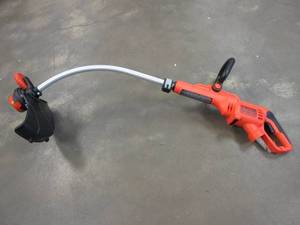 lot 644 image: BLACKDECKER 14 in. 7.5 AMP Corded Electric Curved Shaft 0.080 in. Single Line 2-in-1 String Trimmer & Lawn Edger with Automatic Feed