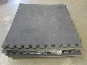 lot 676 image: PACK OF 7 - TrafficMaster Black 25.2 in. x 25.2 in. x 0.68 in. Foam Shock Absorbing Gym Floor Tiles