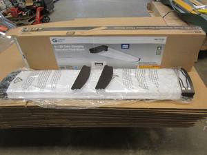 lot 679 image: Commercial Electric Moroccan 48 in. x 10 in. Dark Bronze CCT Selectable LED Flush Mount Ceiling Light 4000 Dimmable Lumens (OPEN BOX)