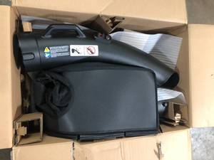 lot 6 image: RYOBI 30 in. Bagger for RYOBI 48V 30 in. Riding Mowers    Customer Returns See Pictures