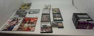 lot 83 image: Heavy MetalMETALLICA Collection of (6) DVDs with one empty (8) VHS Tapes (2) Cassette Tapes Magazines Etc.