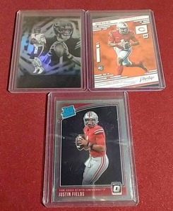lot 99 image: (3) 2021 Justin Fields Rookie Cards