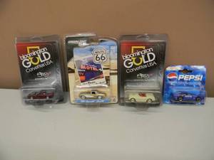 lot 34 image: SET OF 4 COLLECTIBLE 164 SCALE CARS - NICE - NEW IN THE PACKAGE - COOL PIECES - SEE PICTURES