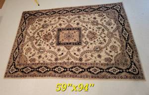 lot 148 image: Indian Tufted Area Rug