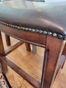 lot 232 image: Brass Tacked Embellished Saddle Stools  set of 2