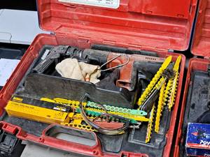 lot 17 image: Hilti Fully Automatic Powder-Actuated Nailer DX351 with Nail Magazine X-MX32, Accessories and a Plastic Carry Case