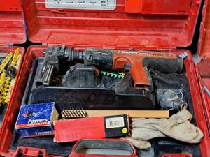 lot 18 image: Hilti Fully Automatic Powder-Actuated Nailer DX351 with Nail Magazine X-MX32, Accessories and a Plastic Carry Case