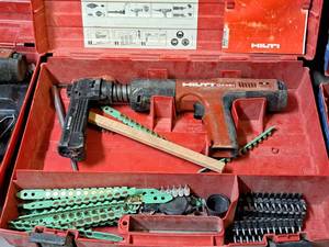 lot 19 image: Hilti Fully Automatic Powder-Actuated Nailer DX351 with Nail Magazine X-MX32, Accessories and a Plastic Carry Case