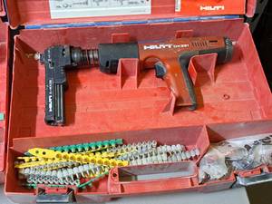 lot 20 image: Hilti Fully Automatic Powder-Actuated Nailer DX351 with Nail Magazine X-MX32, Accessories and a Plastic Carry Case