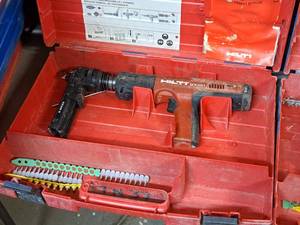 lot 23 image: Hilti Fully Automatic Powder-Actuated Nailer DX351 with Nail Magazine X-MX32 and a Plastic Carry Case