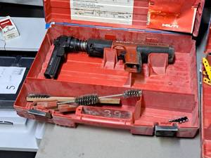 lot 33 image: Hilti Fully Automatic Powder-Actuated Nailer DX351 with Nail Magazine X-MX32, Accessories and a Plastic Carry Case