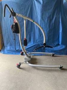 lot 12 image: MSRP $3000 Danish Made Scandinavian Design Ergolet Sole175 Power Patient Lift 385lb Weight Capacity - Whisper Quiet  Just Plug Into A Regular Home Light Socket To Charge&nbspCome Apart In Two Pieces For Easy Transport Works Great