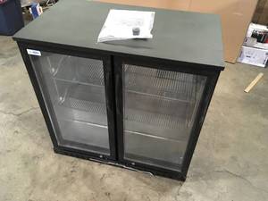 35 in. W 7.4 cu. ft. 2-Glass Door Counter Height Back Bar Cooler Refrigerator with LED Lighting in Black by Koolmore Retails $1200Customer Returns See Pictures