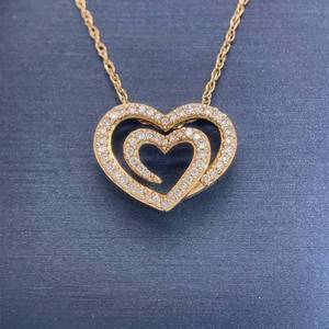 lot 21 image: 0.50ct Diamond Double Heart Swirl Floating Pendant Necklace in 14k Yellow Gold $1,799 Retail VIDEO