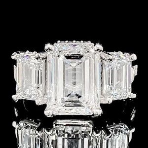 lot 4B image: 7.65 CARATS Breathtaking Heirloom, 3-Stone Emerald Cut Diamond Ring in Platinum $70,600  Retail VIDEO