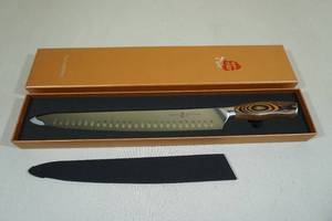 lot 95 image: Tuo Cutlery Fiery Phoenix 12 Slicing Knife