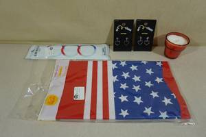 lot 119 image: Assorted Fourth of July -Earrings, Table Cover, Glow Sticks, Candle