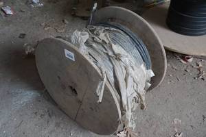 lot 10 image: Spool of PVC Coated 4 Strand Wire