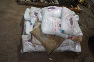 lot 32 image: Pallet of Red Flint Sand and Gravel