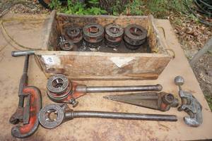 lot 49 image: Ridgid Ratcheting Manual Pipe Threader with Dies, Reamer, and Cutters