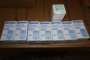 lot 118 image: 7 NEW Simmons 1-14 Check Valves - Plus 1 Midwest
