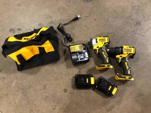 lot 39 image: DEWALT ATOMIC 20V MAX Cordless Brushless Compact DrillImpact 2 Tool Combo Kit  Customer Returns See Pictures