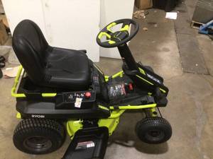 lot 1 image: RYOBI 48V Brushless 30 in. 50 Ah Battery Electric Rear Engine Riding Mower Customer Returns See Pictures