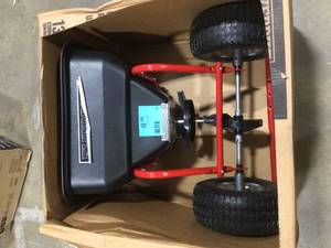 lot 33 image: Everbilt 130 lbs. Tow Broadcast Spreader  Customer Returns  See Pictures