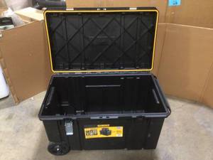 lot 39 image: DEWALT Tough Chest 38 in. W 63 Gal. Polypropylene Rolling Tool Box Customer Returns  See Pictures