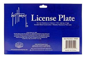 lot 28 image: Pirate Skull and Shark Florida Coast Guy Harvey Front License Plate