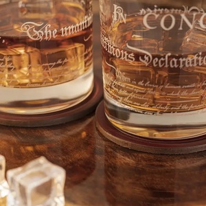 lot 52 image: 12 Gauge Style Leather Coasters - Set of 2