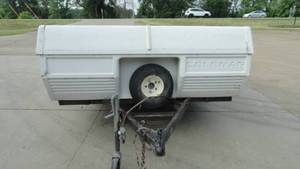 lot 18 image: Pop up Camper  Coleman