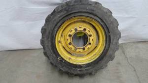 lot 4 image: Gehl skid Loader Rim 8 hole