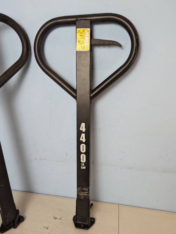 lot 84 image: 2 Pallet Jack Handles - See Pictures