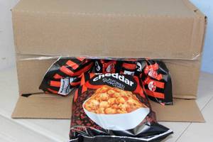 lot 170 image: Case of 6 Bags of Circle K Hot Chedder Popcorn Best  By 3212023