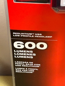 lot 64 image: Milwaukee 2115-21 Red Lithium USB3.0 Rechargeable 600-Lumen Low-Profile Headlamp