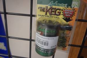 lot 66 image: Lohman Model 125 The Keg Deer GruntBleat Can w Quaker Boy Twist a Bleat Screw In Tree Bleat Can Holder