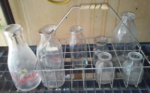 lot 481 image: Milk Crate And Milk Bottles.