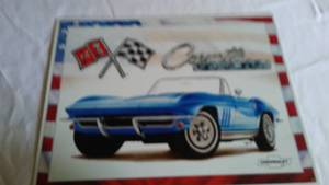 lot 530 image: Corvette Sting Ray Metal Sign