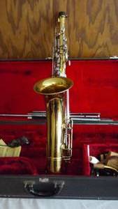 lot 543 image: Buescher Tenor Saxophone WCase. Music Stand, Reeds And More. Professional Quality.