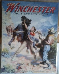 lot 546 image: Winchester Guns And Cartridges Metal Wall Dcor.