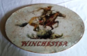 lot 548 image: Oral Winchester Metal Sign.