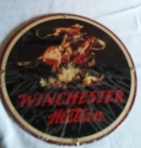 lot 549 image: Winchester Western Metal Sign.