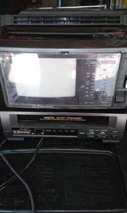 lot 746 image: Emerson Vhs Player And Small TV.