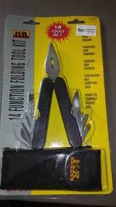 lot 585 image: 14 In One Leatherman Tools,