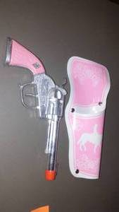 lot 904 image: Pink Toy Gun And Holster.